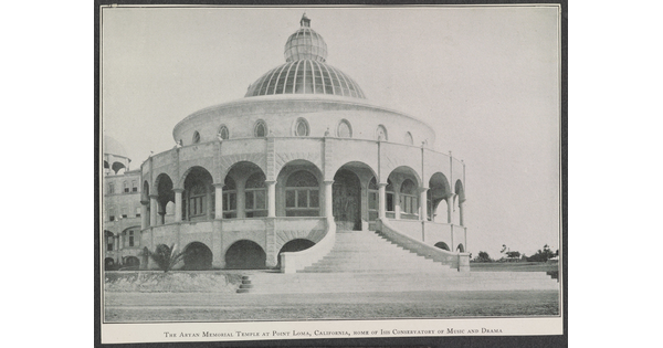 A black-and-white photograph of a circular building adorned with arches, windows, and a dome.