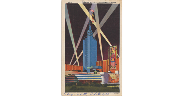 A color postcard of a tall, modern skyscraper illuminated by beams of light.
