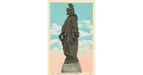 A color postcard of a sculpted figure holding a sword and shield.