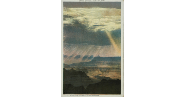 A color photograph postcard of a series of canyon cliffs and clouds with streaks of light and rain.