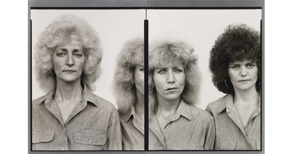 Two side-by-side black-and-white portrait photographs of three White women, two with teased blonde hair and one with teased dark hair, the woman in the center broken by the photograph division.