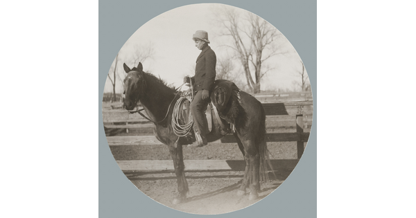 A circular black-and-white photograph of a White man on horseback in profile.