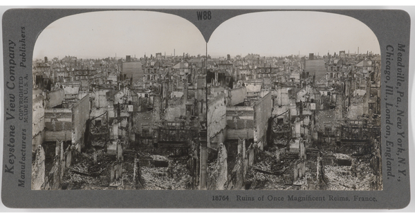 Two almost identical side-by-side black-and-white photographs of a city in ruins covered in debris.