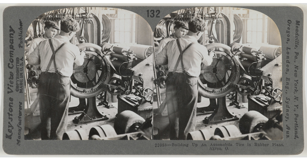 Two almost identical side-by-side black-and-white photographs of two White men in a factory working at a machine.