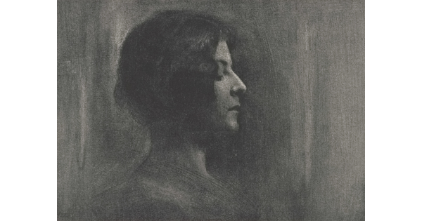 A black -and-white portrait photograph of a young White woman in profile, eyes closed.