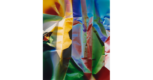A color photograph of what looks like crinkled paper in yellow, blue, green, and red.